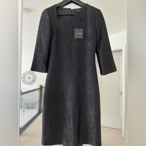 Authentic NWT
St. John Collection
Asymmetrical Neck Sequin
Knit Dress
Size: 2
